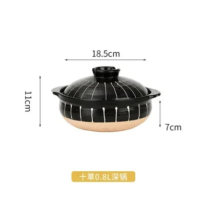 Black glazed earthenware clay casserole pot with wooden base, 0.8L capacity, 18.5cm width, ideal for slow cooking soups and s