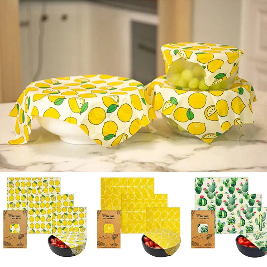 Reusable beeswax food wraps with lemon print design covering bowls, shown with product packaging options and alternative cact