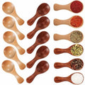 Wooden measuring scoops in natural and dark wood, displaying various spices, seeds, and ingredients in round bowls with handl