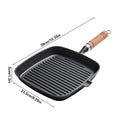 Cast iron square grill pan with ridged cooking surface, wooden handle, and drip spout. Dimensions shown: 23.5cm x 36cm x 39cm