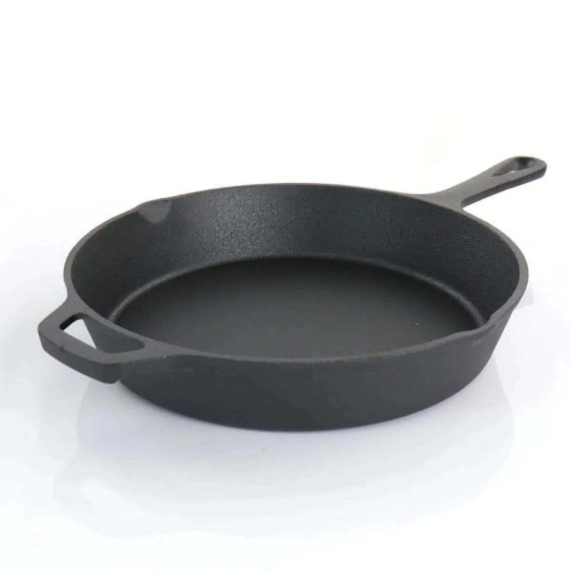 Black cast iron skillet with long handle and dual side handles, displaying non-stick pre-seasoned surface for eco-friendly co