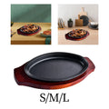 Cast iron fajita griddle pan with wooden serving board in small, medium, and large sizes, shown in styled kitchen settings.