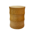 Bamboo food storage box with natural finish, cylindrical design, and metal bands dividing three compartments for tea, nuts, a