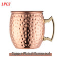 Copper Plated Hammered Insulated Travel Mug with brass handle and textured dimple finish, single piece.