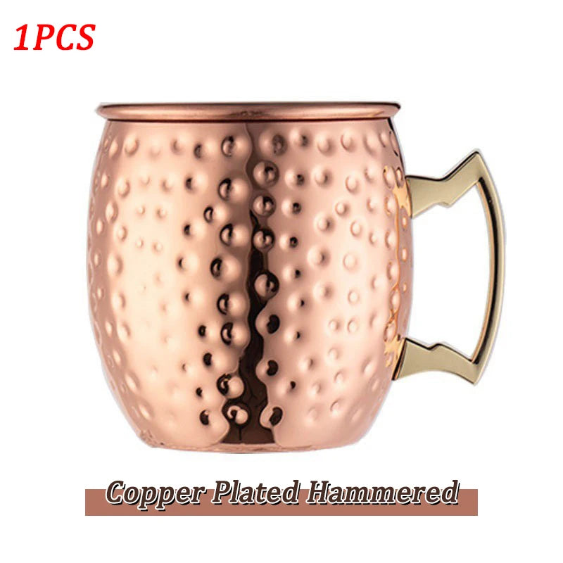 Copper Plated Hammered Insulated Travel Mug with brass handle and textured dimple finish, single piece.