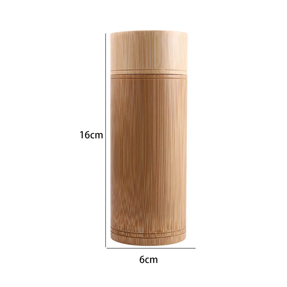Cylindrical bamboo tea storage canister, 16cm tall, with natural wood grain finish and decorative band details, eco-friendly 