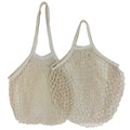 Two natural cotton mesh grocery bags with long handles, ideal for carrying vegetables and produce at market in an eco-friendl