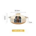 Cream earthenware clay casserole pot with black geometric design, 0.8L capacity, 18.5cm width, handles, and cork base.