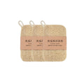 Three natural loofah dish scrubbers with rope loops, packaged together with kraft paper band and Chinese text labeling.