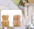 Wooden dish brush with round feel and coconut fiber bristles, shown from front and side view