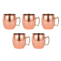 Set of 5 hammered copper Moscow mule mugs with brass handles and stainless steel interiors, displayed against white backgroun