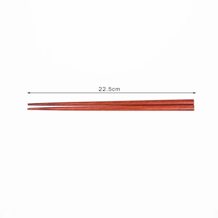 Pair of wooden chopsticks in natural red-brown finish, 22.5cm long, displayed against white background for eco-friendly kitch