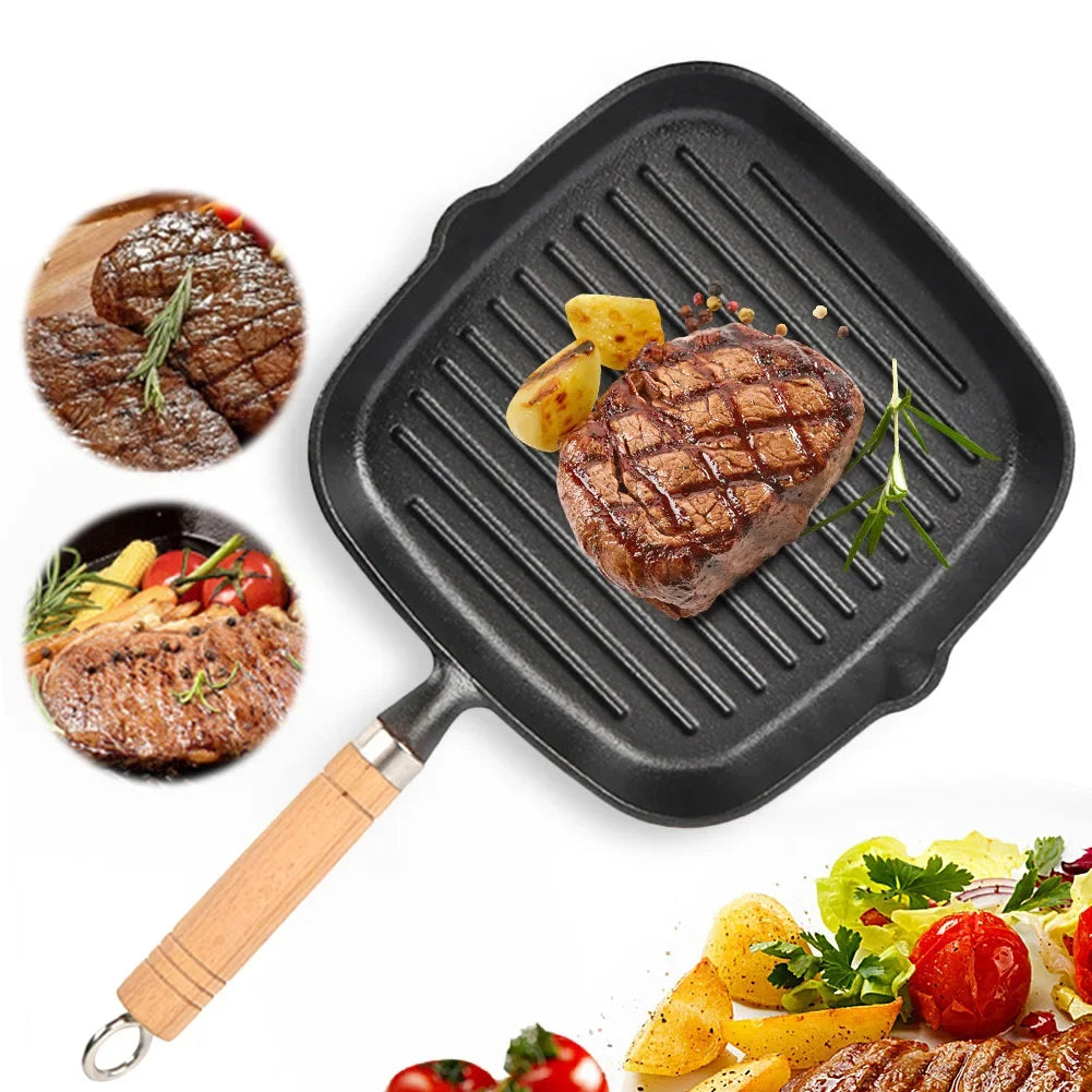 Cast iron square grill pan with wooden handle, featuring seared steak and vegetables with grill marks and drip spout.