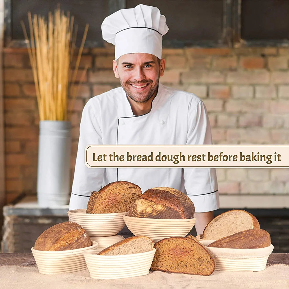 Handmade natural rattan bread proofing baskets displayed with fresh baked loaves and smiling baker in white chef's uniform.