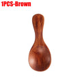 Brown wooden mini scoop spoon with rounded bowl and long handle, ideal for tea, honey, and coffee measuring.