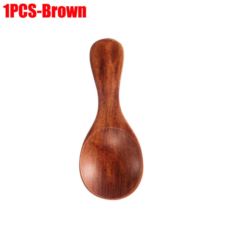 Brown wooden mini scoop spoon with rounded bowl and long handle, ideal for tea, honey, and coffee measuring.