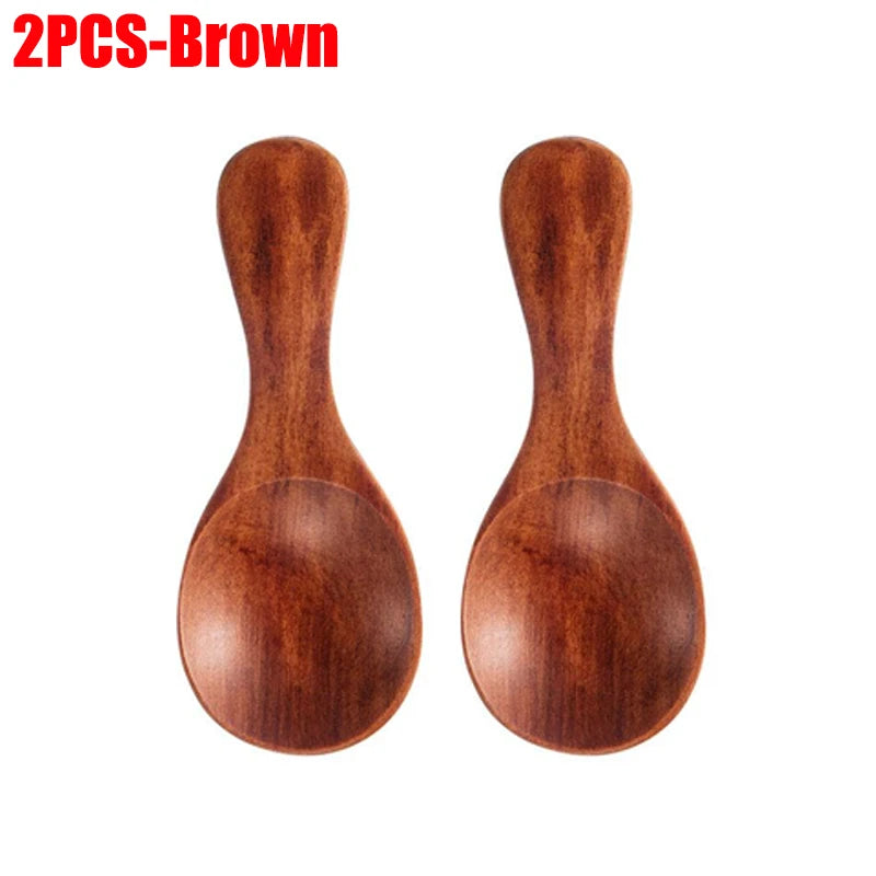 Two brown wooden mini scoop spoons with rounded bowls and long handles, ideal for tea, honey, and coffee.