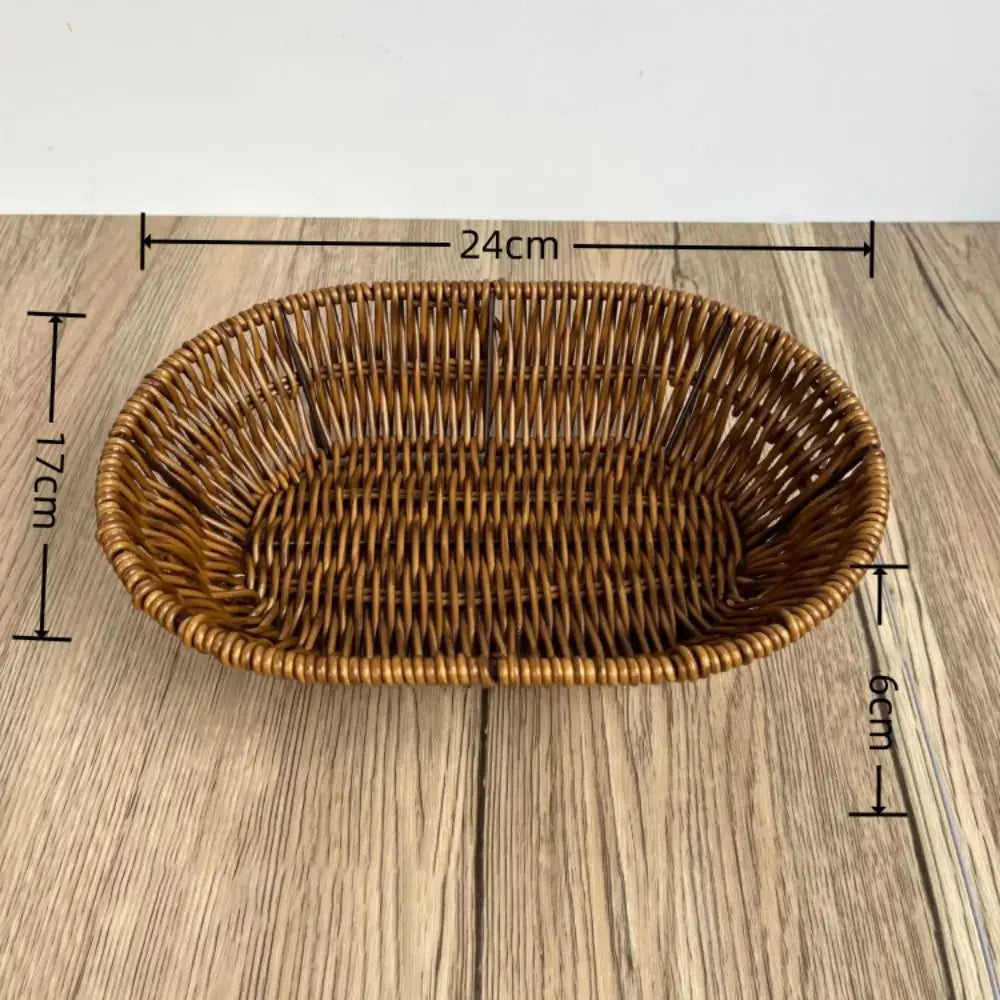 Hand-woven rattan bread basket with natural tan finish, 24cm width, displayed on wooden surface with measurement markers.