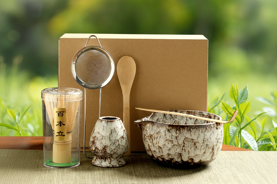 Japanese matcha tea set with bamboo whisk, wooden spoon, ceramic bowls, strainer, and whisk holder on eco-friendly kraft pack