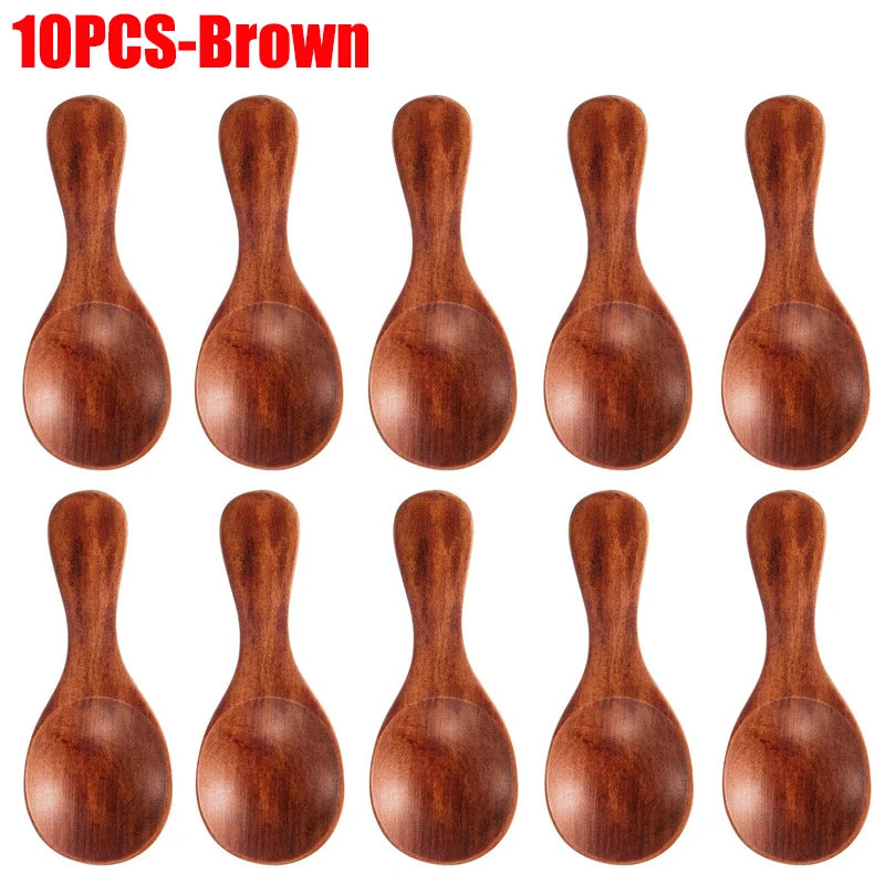 10 brown wooden mini scoop spoons with round bowls and tapered handles for tea, honey, and coffee servings.