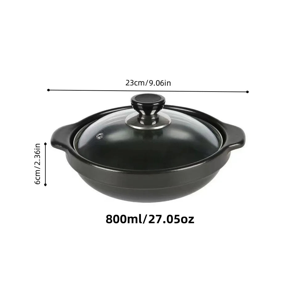 Black ceramic clay cooking pot with glass lid, 800ml capacity, 23cm width, traditional design for rice and broth cooking.