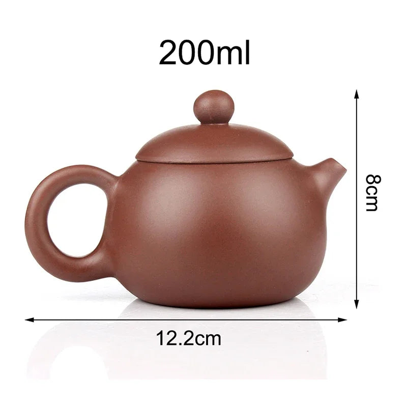 Purple clay teapot, 200ml capacity, handmade with curved body, lid with finial, curved handle, 8cm height, 12.2cm width