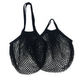 Black cotton mesh produce bag with two handles, empty and laid flat against white background