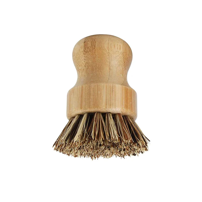 Bamboo dish brush with natural bristles and replaceable head, eco-friendly kitchen cleaning tool for sustainable home care.