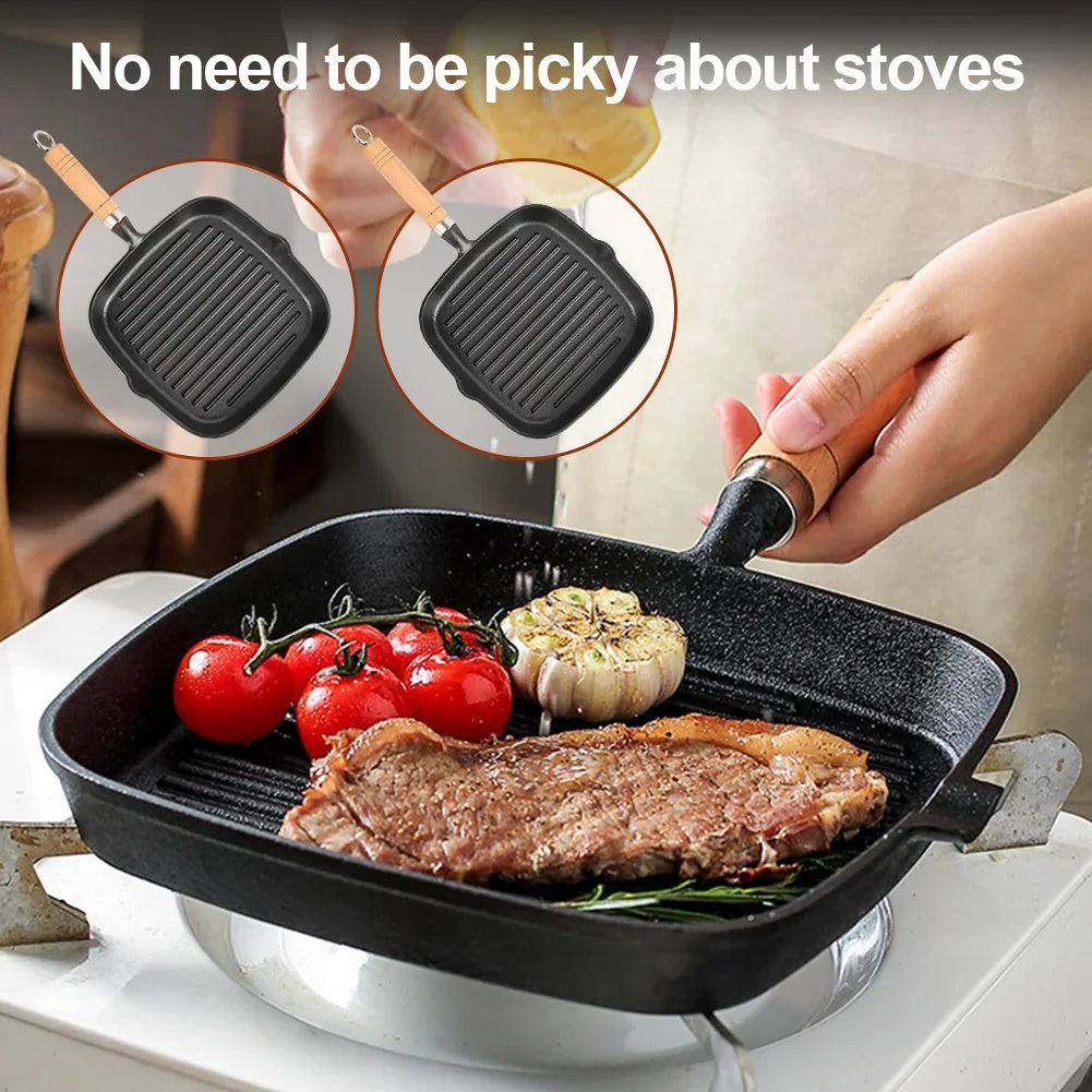 Cast iron square grill pan with wooden handle, drip spout, cooking steak and vegetables on stovetop