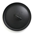 Black cast iron skillet lid with textured surface and heat-resistant handle knob, pre-seasoned non-stick cookware.