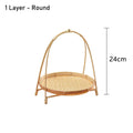 Round bamboo basket with single woven layer, natural finish, 24cm height, featuring arched handles and open top design.
