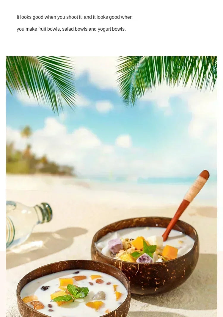 Coconut wood dessert bowls with wooden spoons filled with yogurt and fresh fruit on a tropical beach setting with palm trees.