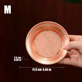 Pure copper serving plate with hammered texture held in hand, showing 11.3 cm diameter and artisanal craftsmanship for eco-fr