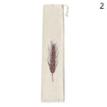Handmade organic linen bread bag with burgundy wheat grain design, drawstring closure, reusable eco-friendly loaf storage.