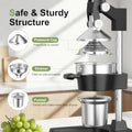 Manual cast iron juicer with stainless steel cup showing pressure cap, strainer, and funnel components for extracting fruit j