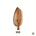Natural wooden palm leaf-shaped dessert tray, handcrafted from sustainable wood with organic curves and stem handle, size S.