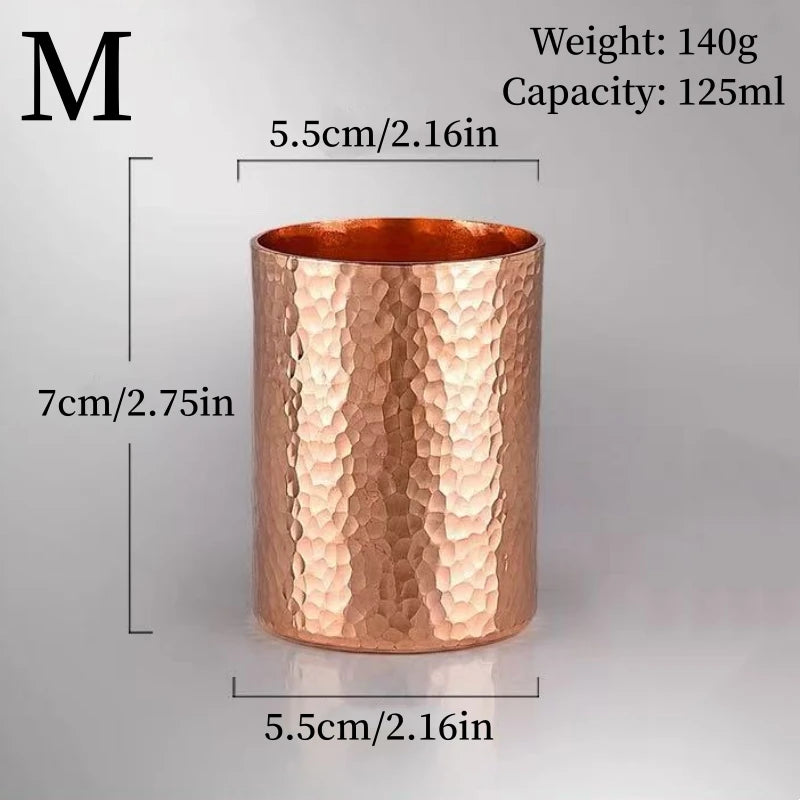 Hammered copper mug size M with 125ml capacity, showing textured surface and dimensions of 7cm height by 5.5cm width