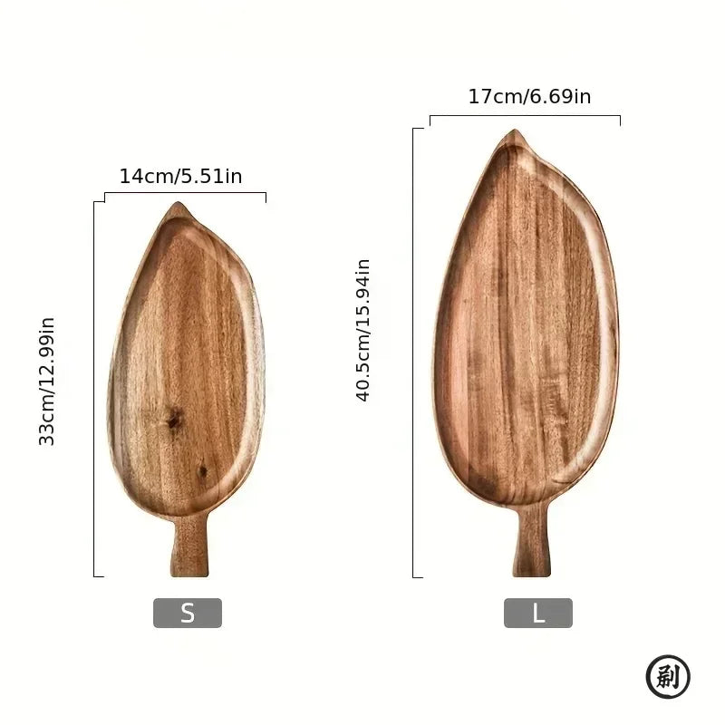 Two wooden palm leaf-shaped dessert trays in natural wood grain, shown in small (33cm) and large (40.5cm) sizes with dimensio