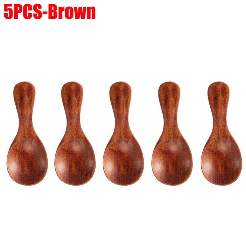 Five brown wooden mini scoop spoons with rounded bowls and tapered handles, ideal for tea, honey, and coffee measurement.