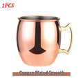 Copper plated smooth Moscow mule mug with brass handle and stainless steel interior, single unit shown against white backgrou