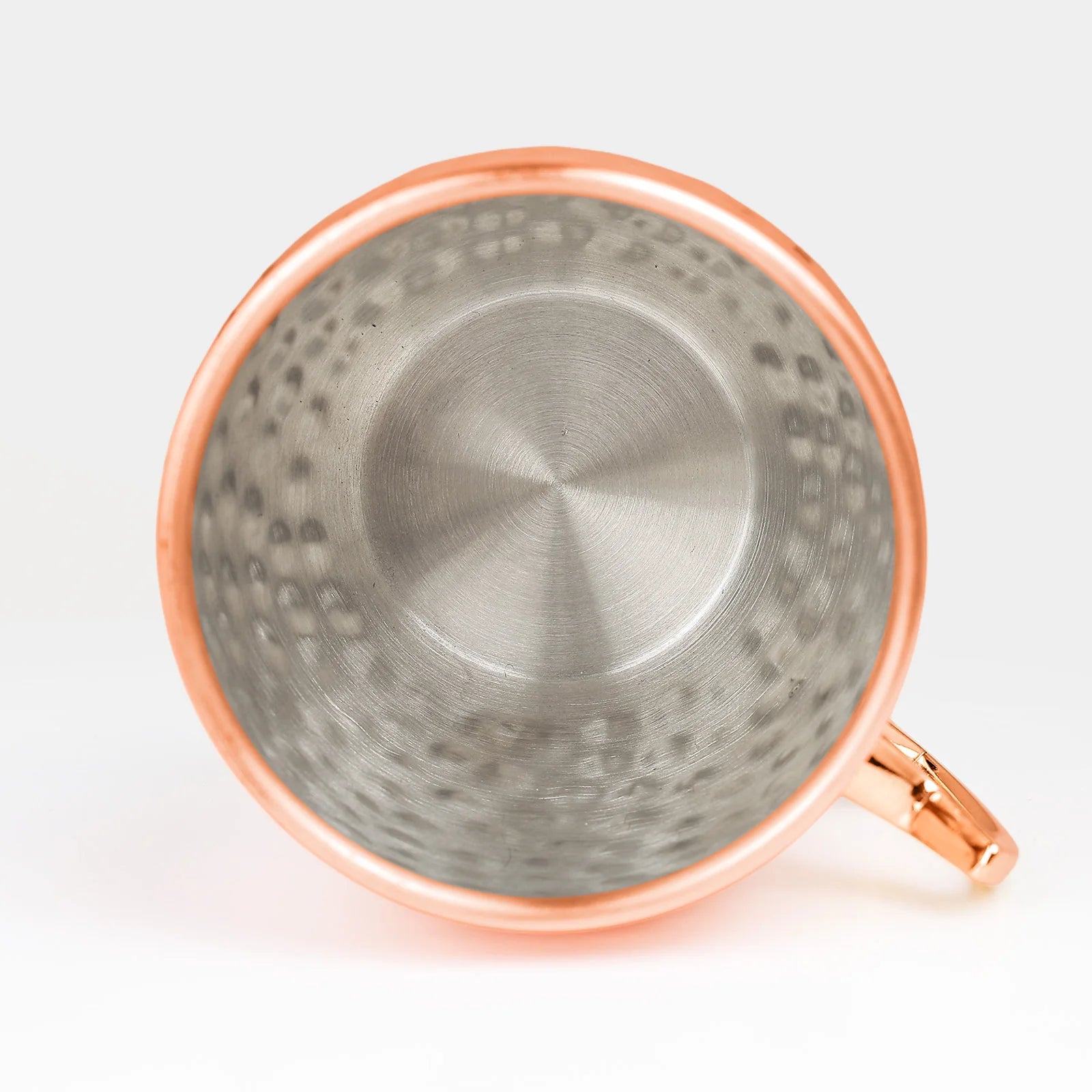 Insulated copper travel cup with hammered finish interior, double-wall design, and rose gold handle detail