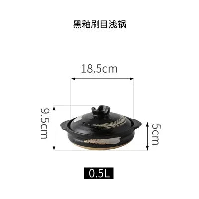 Black clay casserole pot with lid, 0.5L capacity, 18.5cm width, eco-friendly earthenware for slow cooking soups and stews.