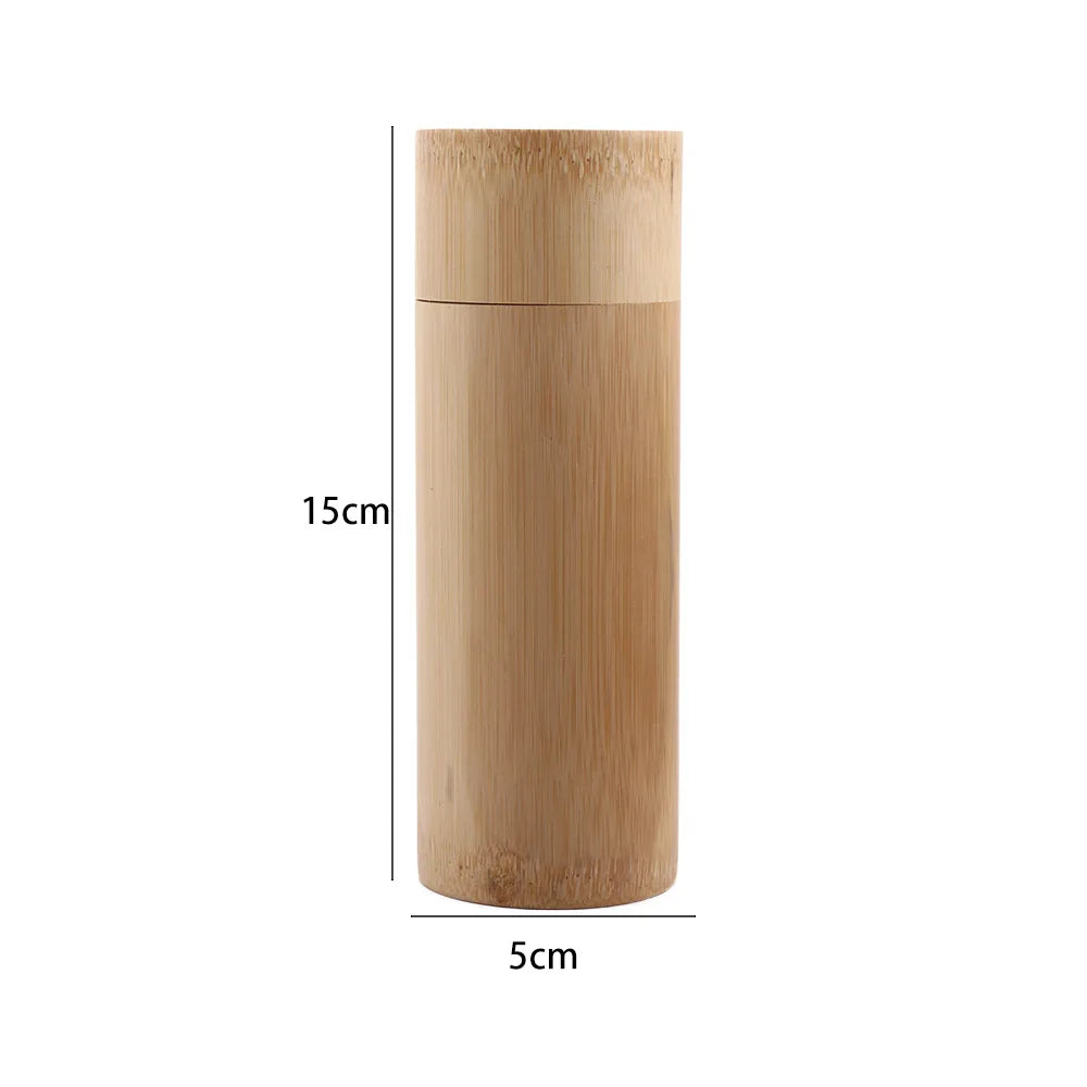Cylindrical bamboo tea storage canister, 15cm height, 5cm diameter, with sliding lid and natural wood grain finish.