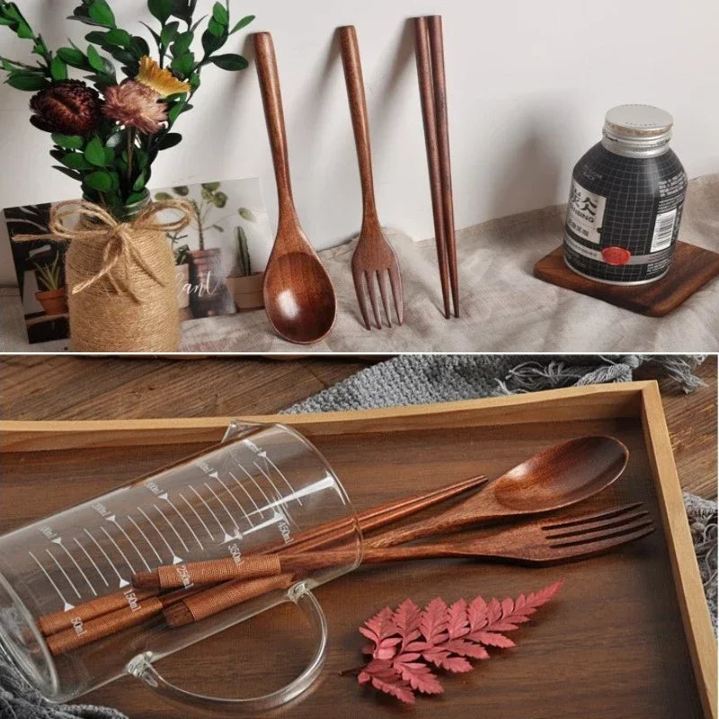 Portable wooden cutlery set with spoon, fork, and chopsticks in carrying case, displayed on wooden tray with eco-friendly pac