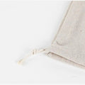Handmade organic linen bread bag with frayed edges, natural beige color, displayed flat on white background.