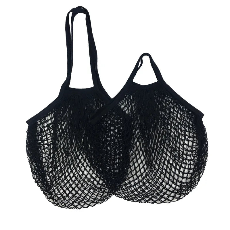 Black cotton mesh grocery bag with two handles and open weave design for carrying produce and vegetables