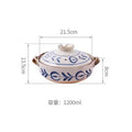 Earthenware clay casserole pot with blue floral design, 1200ml capacity, featuring handles and lid, dimensions 21.5cm x 13.5c