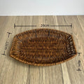 Hand-woven rattan bread basket with dimensions marked: 29cm length, 22cm width, 4cm height, displayed on wooden surface.