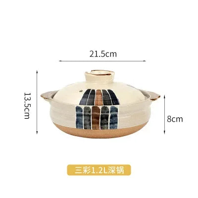 Ceramic clay casserole pot with wooden base, 1.2L capacity, cream and black design, 21.5cm width, slow-cook cookware.