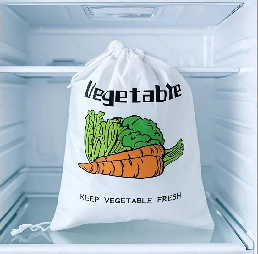 White mesh vegetable storage bag in refrigerator with carrot and lettuce illustration, drawstring closure, labeled "Keep Vege